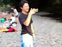 Japanese boy changing swim trunks in front of boys and girls!